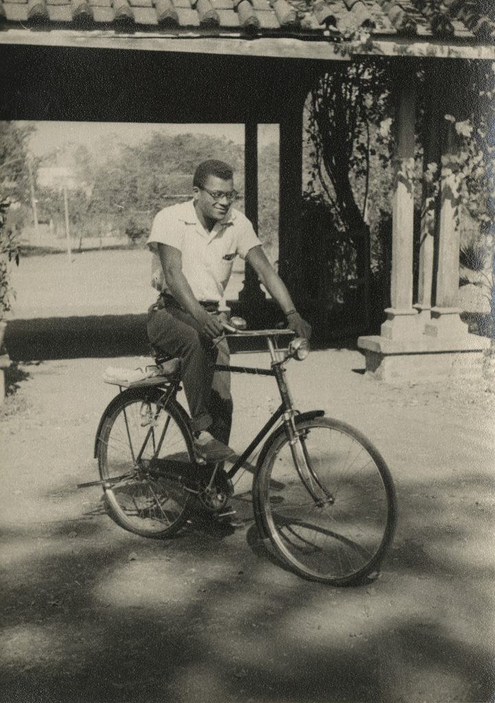 [James Lawson on His Bicycle in Nagpur, India]