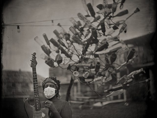 Lucious Spiller and bottle tree, Clarksdale, MS 2020
