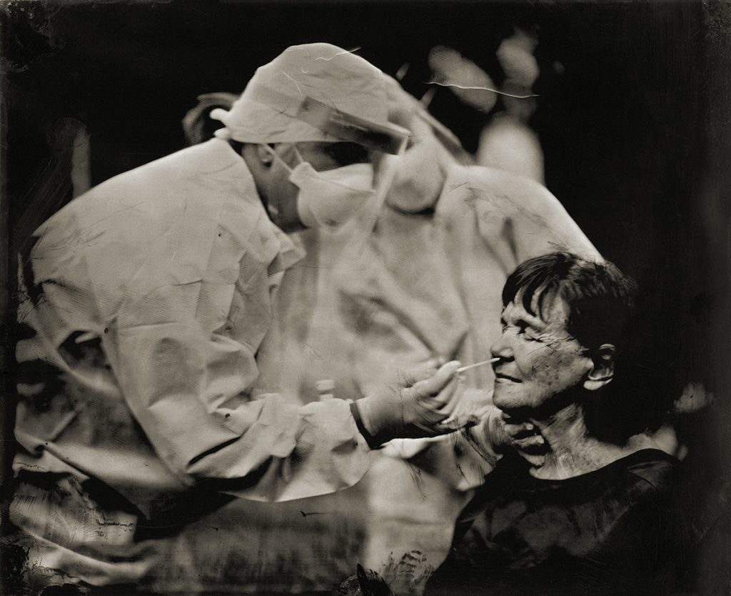 Pat Casey Daley getting Covid test, Murfreesboro, TN 2020. Bill Steber. Carbon print from wet plate collodion tintype.