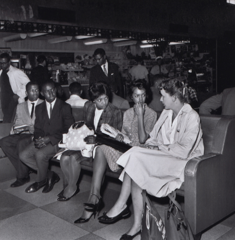 [Freedom Riders, John Lewis, Charles Butler, Catherine Burks Brooks, Lucretia Collins, and Salynn McCollum Sit on a Bench in the Birmingham Greyhound Station].